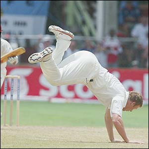 Andrew Flintoff makes a dramatic attempt to stop Ramnaresh Sarwan's shot