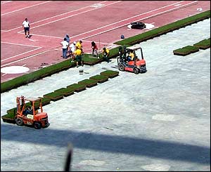 55000 pallates of grass being relaid in the Olympic stadium