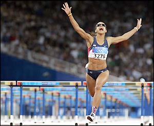 Joanna Hayes sets a time of 12.37 seconds