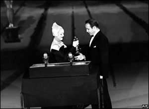 Marlon Brando collects his Best Actor Oscar for On the Waterfront 