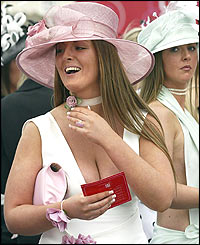 A delicate pink hat is emphasised by matching accessories