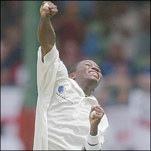 Edwards takes his third wicket of the innings as he dismisses skipper Michael Vaughan