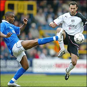 Morrison battles for the ball with Legwinski 