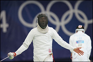 Rustem Sabirkhuzin celebrates his fencing win in the modern pentathlon