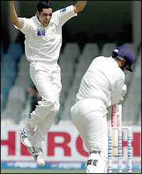 Teenager Umar Gul collects his first wicket of the game as Sehwag goes for 39