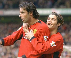 Ruud van Nistelrooy is congratulated by Cristiano Ronaldo