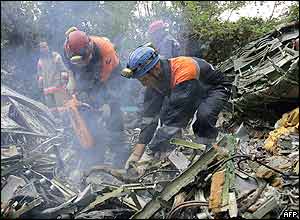 Investigators at one crash site