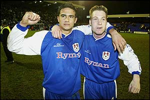 Cahill's and Harris' goals sent Millwall to the semi finals