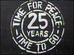 Poster in Northern Ireland reads "25 Years - Time for Peace - Time to Go"