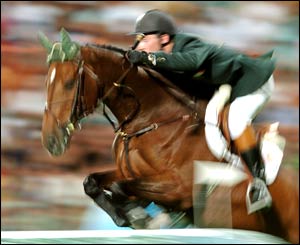 O'Connor clears a fence on his way to gold with his horse Waterford Crystal 