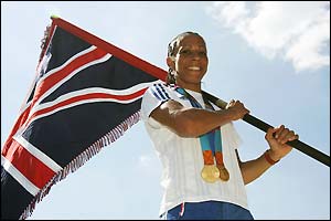 Kelly Holmes shows off her two gold medals