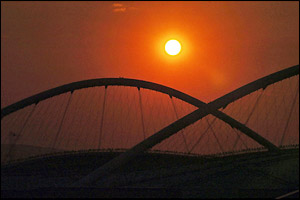 The sun sets over the Olympic Stadium and another Olympiad comes to an end