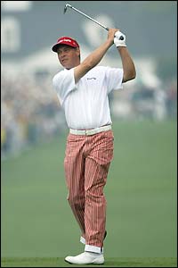 Darren Clarke plays his second shot at the first hole