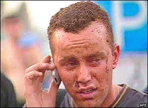 A man caught up in the attack talks on his phone