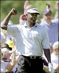 Fiji's Vijay Singh celebrates making a putt