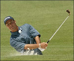 America's Chris Di Marco plays a bunker shot
