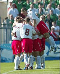 Poland's players celebrate taking the lead