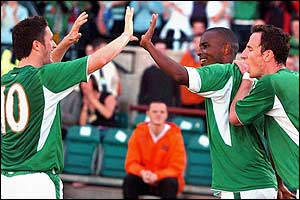 Robbie Keane congratulates Clinton Morrison