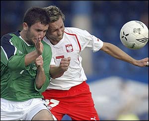 Damien Johnson launches an attack