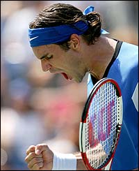 Roger Federer celebrates his win