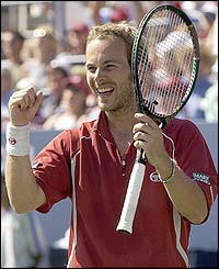 Rochus celebrates his win over Moya