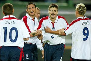 Gerrard is congratulated after scoring England's second goal
