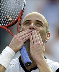 Andre Agassi celebrates 
