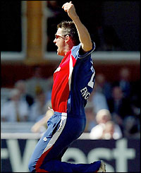 Ashley Giles celebrates the wicket of Virender Sehwag