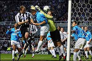Alan Shearer heads home Laurent Robert's corner at the near post