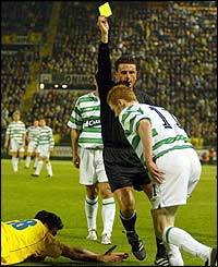 Celtic's Stephen Pearson gets a yellow card 