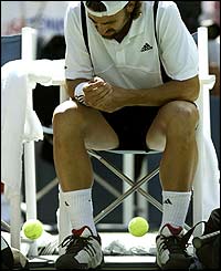 Kiefer pulls out leaving Henman to progress