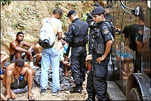 Suspects being guarded by police