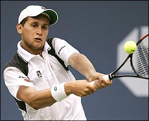 Karol Beck returns a shot