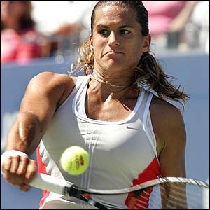 Amelie Mauresmo hits a backhand