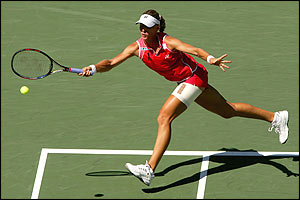 Dementieva lunges to return a shot