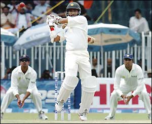 Asif Kamal overcomes a painful elbow injury as he hits a boundary