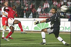 Defoe volleys past Dudek for his first international goal and puts England ahead