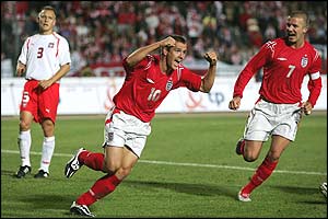 Michael Owen and David Beckham celebrate England's second goal