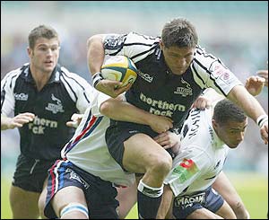 Newcastle's Warren Britz is tackled