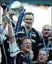 Newcastle Falcons celebrate victory in the Powergen Cup