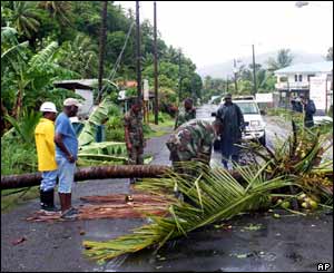 Locals take part in clean-up efforts in the village of Dennery on the coast of Castries, St Lucia