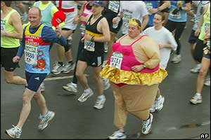 A runner in a ballerina costume find the marathon heavy going