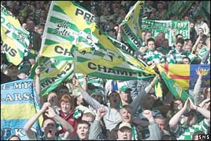 Celtic fans wave flags in celebration