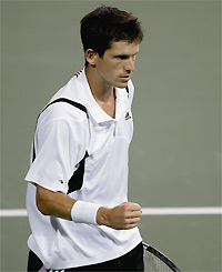 The familiar 'Tiger Tim' clenched fist as he breaks Dominik Hrbaty en route to the semi-final