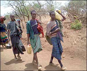 Peasant farmers returning to the highlands from the resettlement camps.
