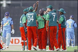 Kenya's players celebrate taking the wicket of Virender Sehwag