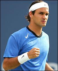 Roger Federer celebrates in controlled fashion