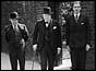 Winston Churchill (c), Air Minister Sir Kingsley Wood, (l), Foreign Secretary Anthony Eden (r) 