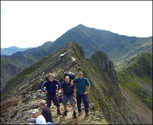 Sam from Barmouth (now Tunbridge Wells), Larry (USA) and JG (South Wales) on top of Crib Goch, Snowdon