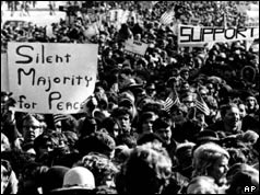Marchers hold up placard reading 'Silent Majority for Peace'
